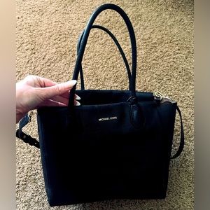 Micheal Kors tote w/ matching wallet.